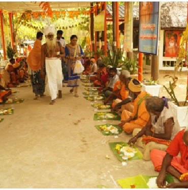 Monks having food on the day of the Guru Feast at the Samadhi of Kalahasthi Barathvaj Maharishi