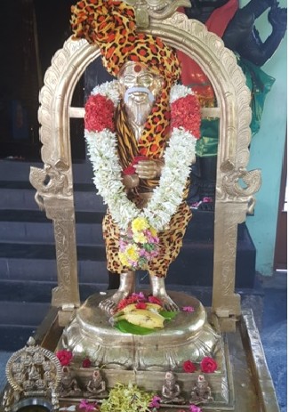 Siddha Kagapujanda known as Thalaiati Siddha